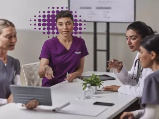 Four nurses in a meeting - purple 